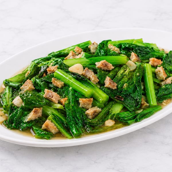 Salted fish with Chinese broccoli stir-fried in garlic sauce.